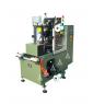 Coil lacing machine